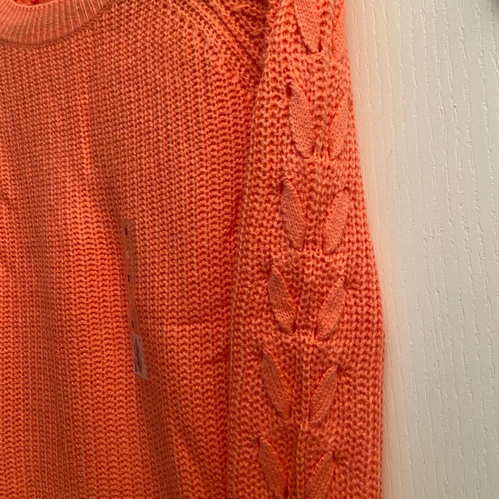SO orange sweater with unique sleeve detail